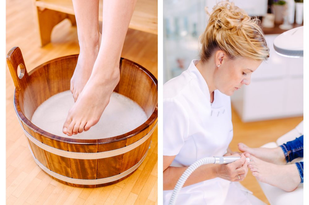 eine Kosmetikerin behandelt die Füße einer Kundin mit einem Fußpflege gerät